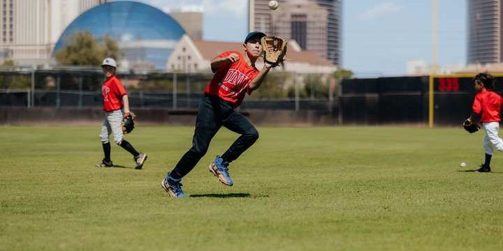 Baseball player working through a defensive repetition at UNLV