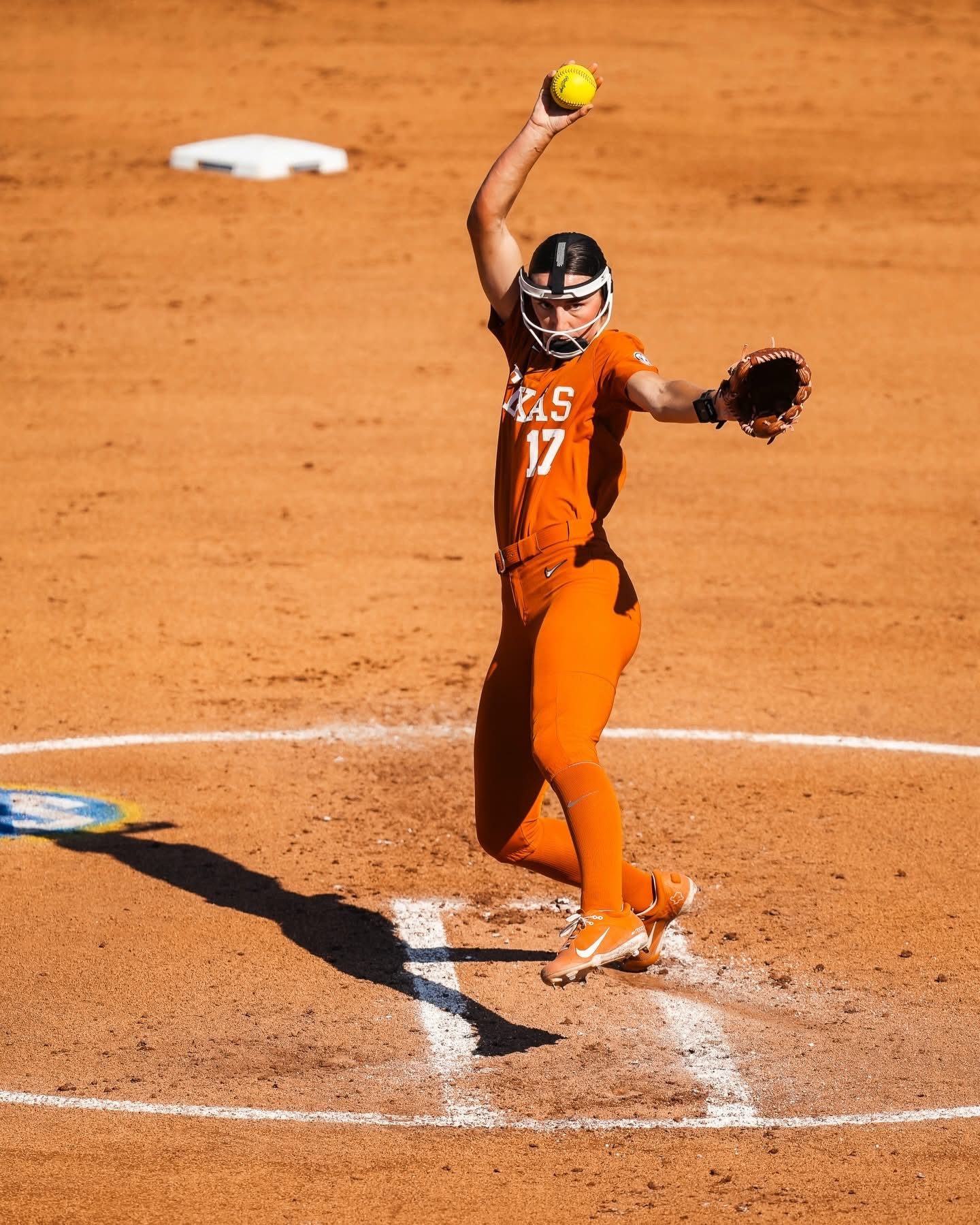 Teagan Kavan winding up in the circle for Texas, #17